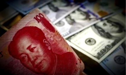 China’s cut of US dollar weighting boost global fortunes of yuan, economists say